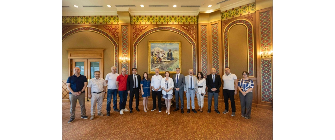 TÜKİB, İzmir Büyükşehir Belediyesi Heyetini Almatı'da Ağırladı 