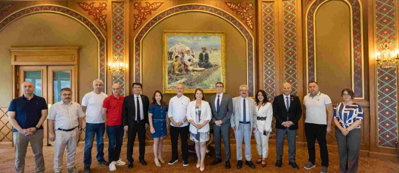 TÜKİB, İzmir Büyükşehir Belediyesi Heyetini Almatı'da Ağırladı 