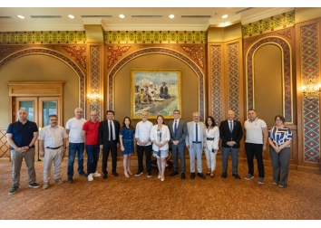 TÜKİB, İzmir Büyükşehir Belediyesi Heyetini Almatı'da Ağırladı
